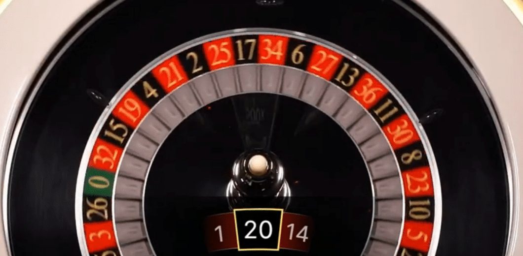 Rueda de la ruleta relámpago con el número 20 ganador y un multiplicador visible sobre el eje